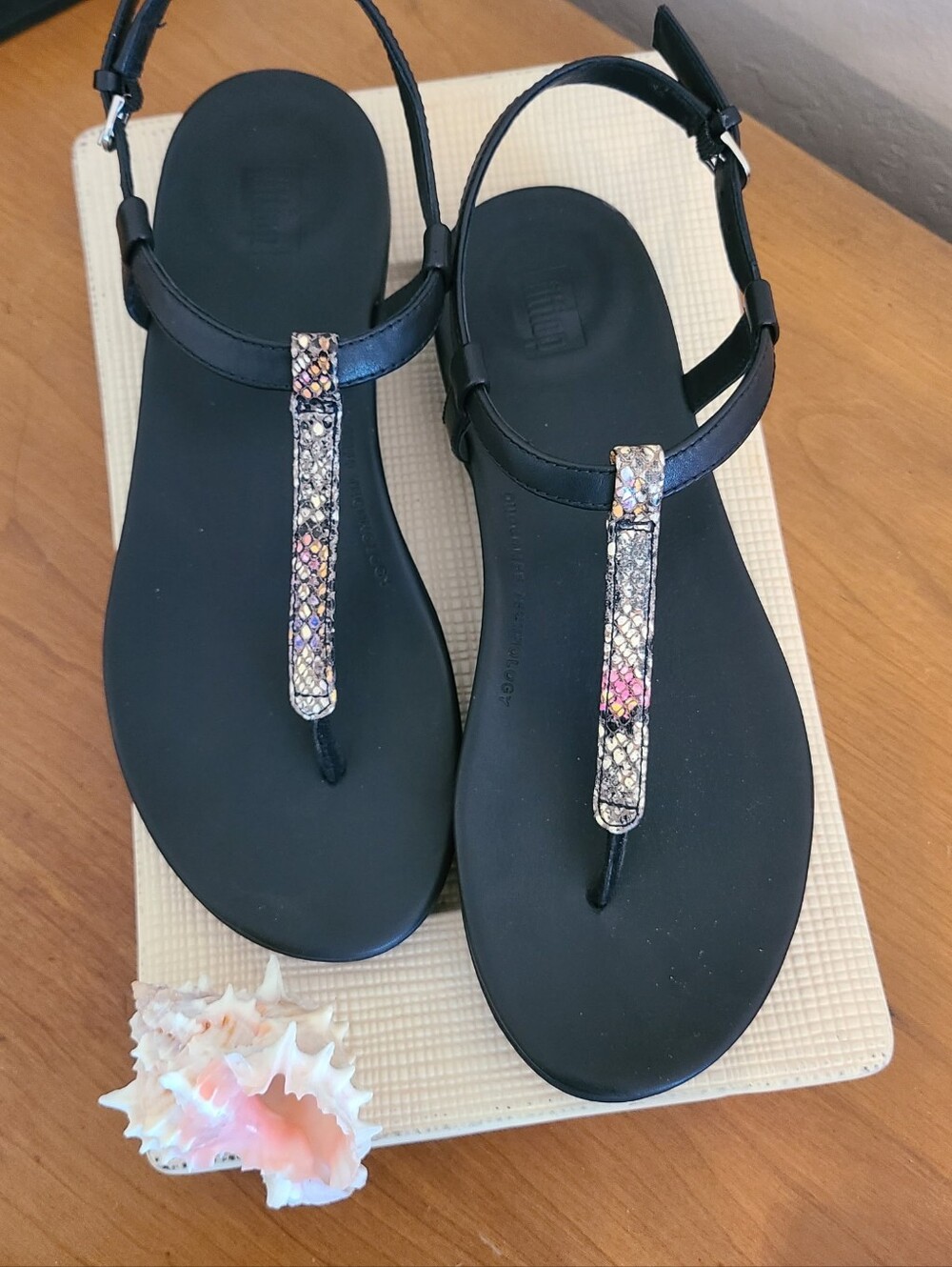 FitFlop Women’s Black T-Strap Sandals with Metallic Snake-Print Accent